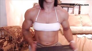 Big Female Bodbuilder flexing biceps cơ bắp